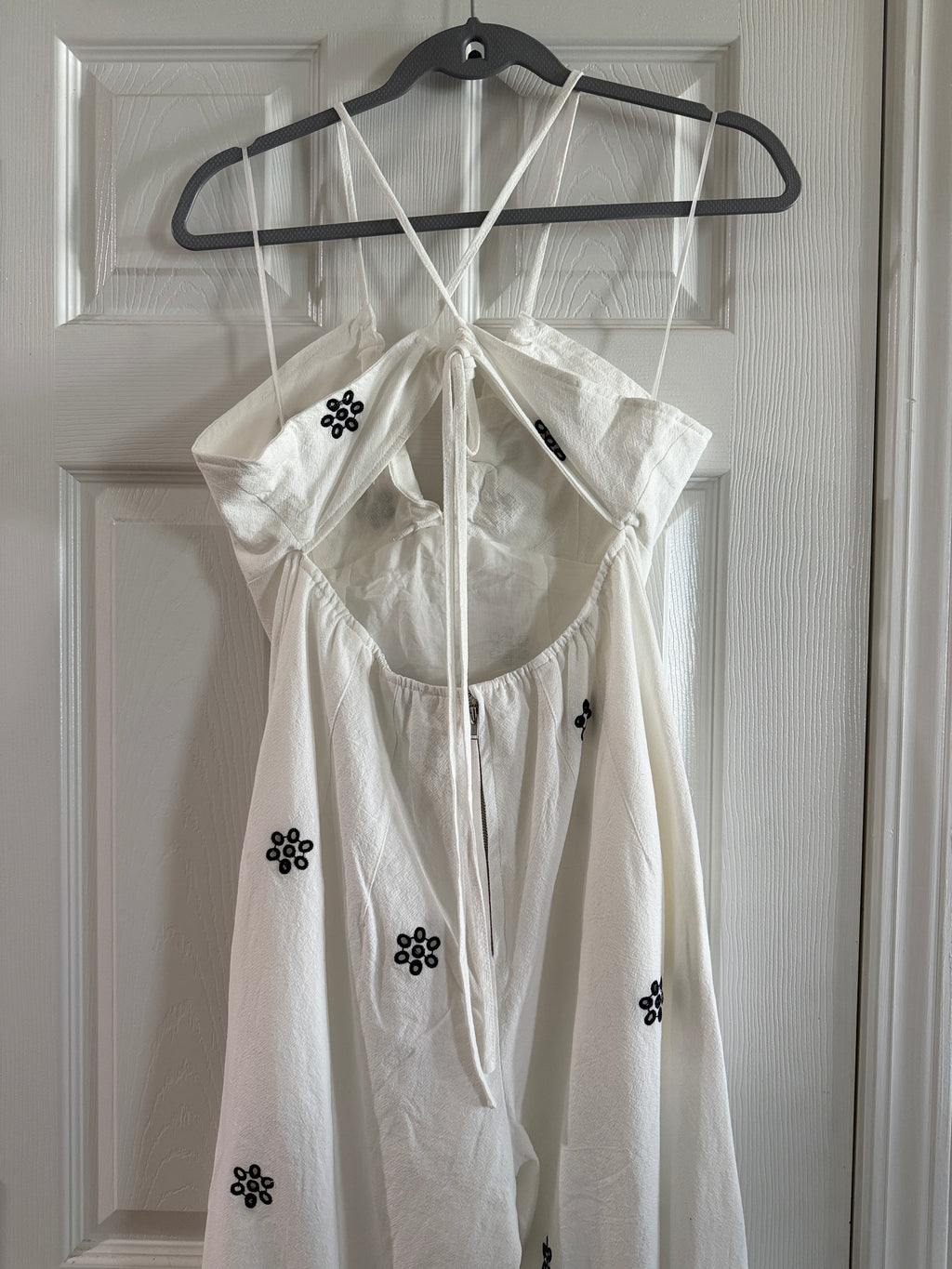 White Spaghetti-Strap Jumpsuit with Black Floral Embroidery
