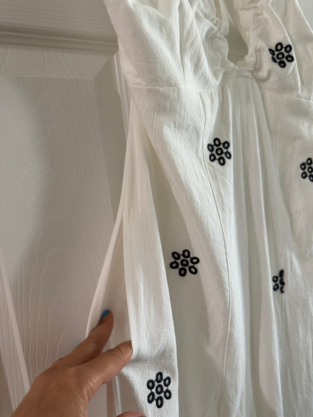 White Spaghetti-Strap Jumpsuit with Black Floral Embroidery