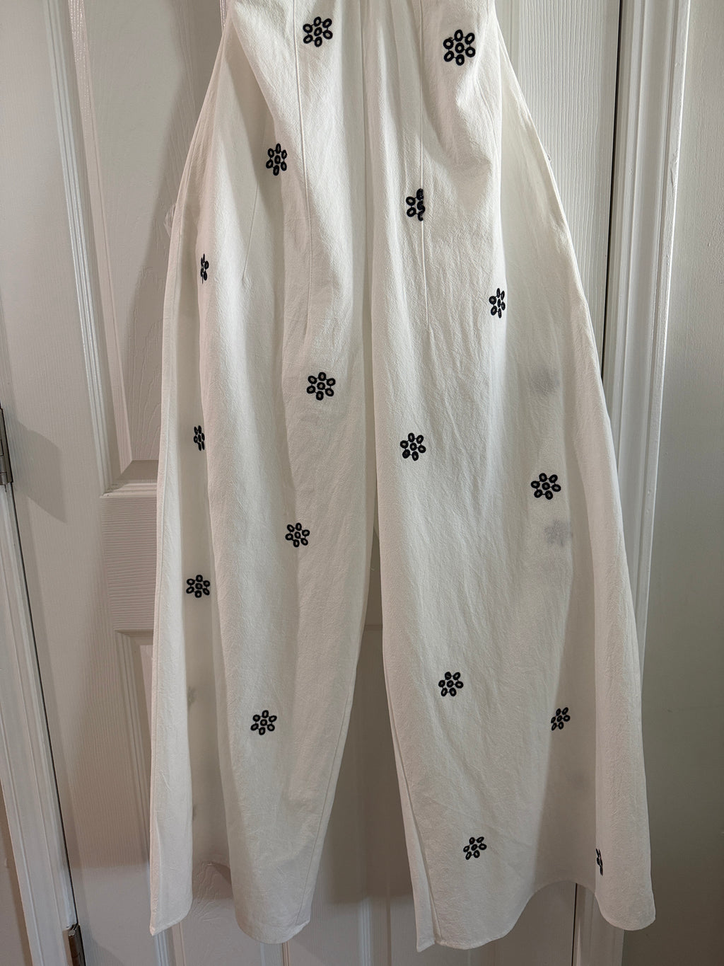 White Spaghetti-Strap Jumpsuit with Black Floral Embroidery