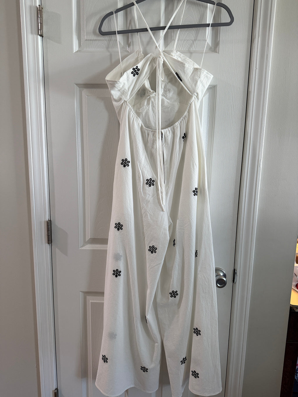 White Spaghetti-Strap Jumpsuit with Black Floral Embroidery
