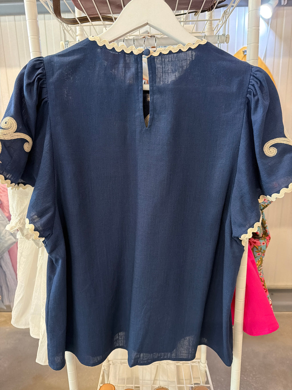 Navy and White Embroidered Floral Details